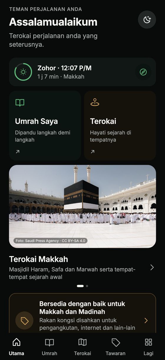 Halaman utama aplikasi Hijaza dengan waktu solat, „Umrah Saya“ dan „Terokai“